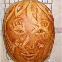 Ember arc kenyér